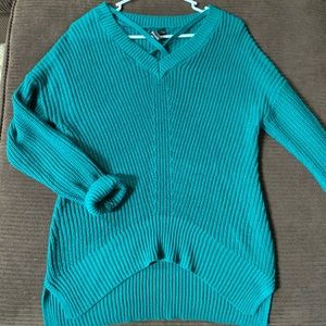 Teal Sweater with crosses at neckline